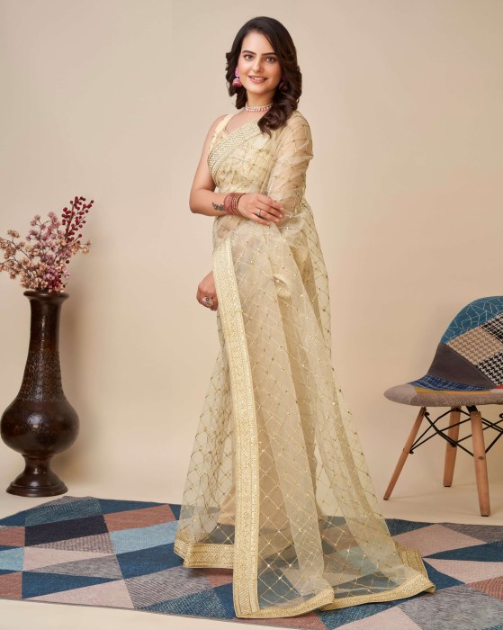 Cream Net fabric Embroidery work Sarees Net Sarees