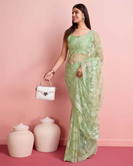 Over Sequence Work  Leaf Pista Net Sarees