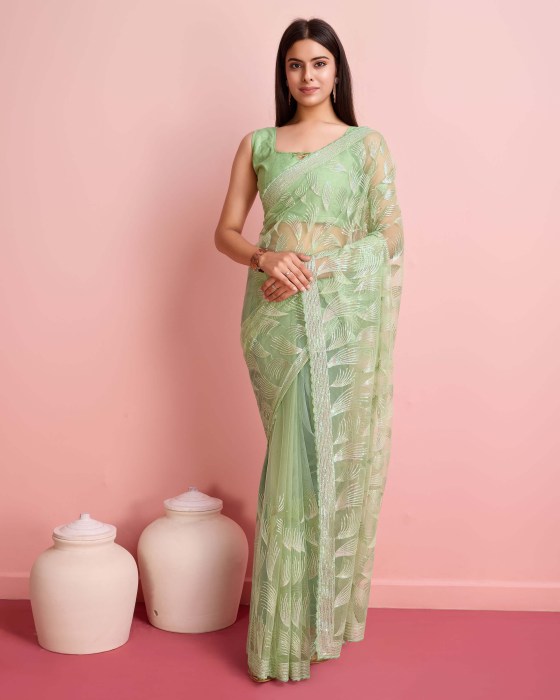 Over Sequence Work  Leaf Pista Net Sarees