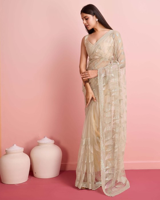 Over Sequence Work  Leaf Off White Net Sarees