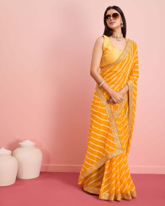 premium Soft Georgette fabric with Embroidered sequins work Saree Yellow Sarees