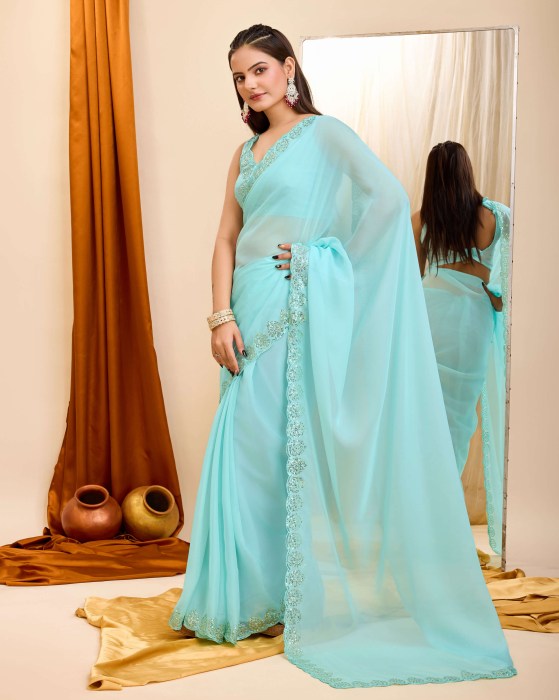 Sky Blue Organza Silk fabric with Copper Sequins work Net Sarees