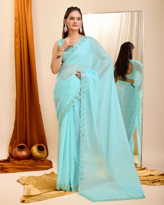 Sky Blue Organza Silk fabric with Copper Sequins work Net Sarees