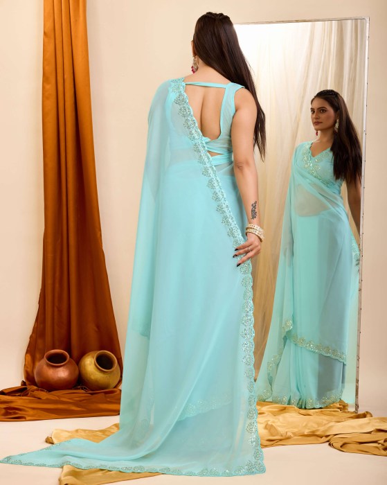 Sky Blue Organza Silk fabric with Copper Sequins work Net Sarees